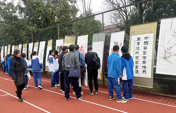 黔西南州老年书画研究会走进乌沙镇中学(图1)
